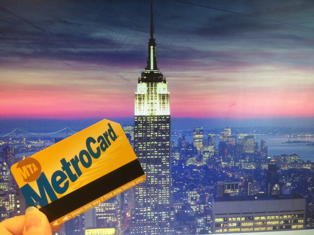 Metrocard in front of NYC skyline