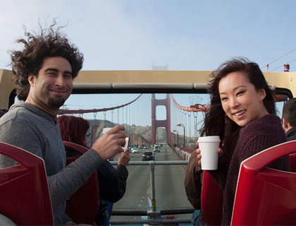 Alcatraz and 48r Hop On Hop Off Combo Ticket- Couple Traveling Over The Golden Gate Bridge