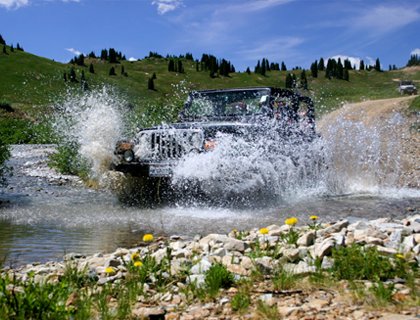 Jeep Safari Side- Jeep Driving Through Water