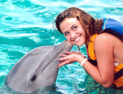 Swim with Dolphins Mayan Riviera and Fantasy Snorkel- Dolphins Kissing Girl On The Cheek